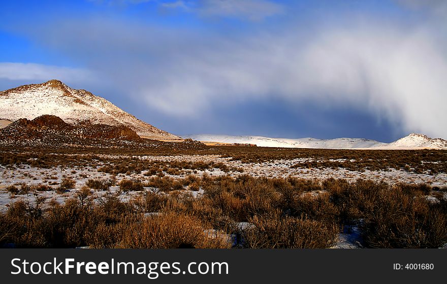 Winter storm passing over high desert mountains near Shoshone Idaho. Winter storm passing over high desert mountains near Shoshone Idaho