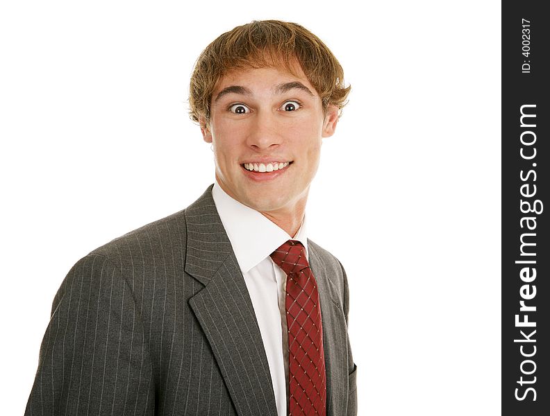 Handsome young businessman surprised.  Isolated on white.