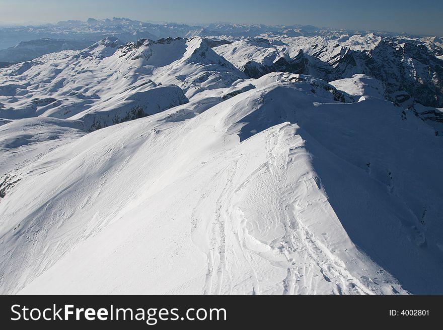 Mountain view - snow-covered ridges. Mountain view - snow-covered ridges