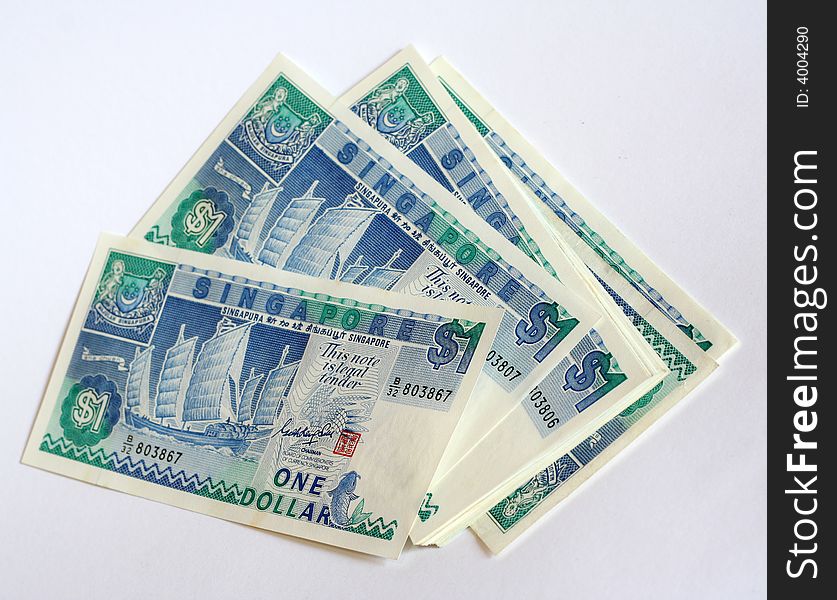 Stack of Singapore one dollar notes. Stack of Singapore one dollar notes.