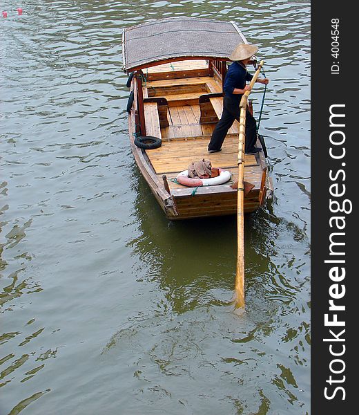 Boatman in Suzhou Canal