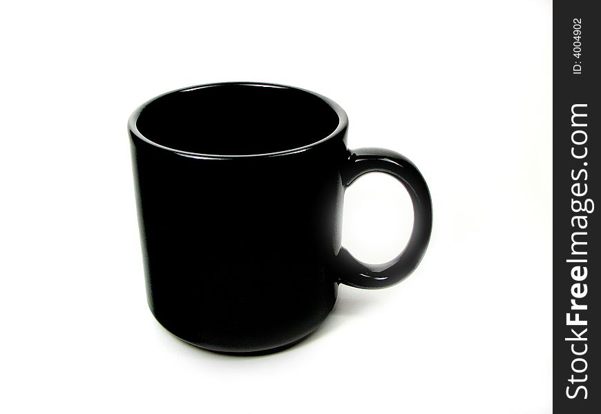 A black ceramic mug, simple and usual. A black ceramic mug, simple and usual.