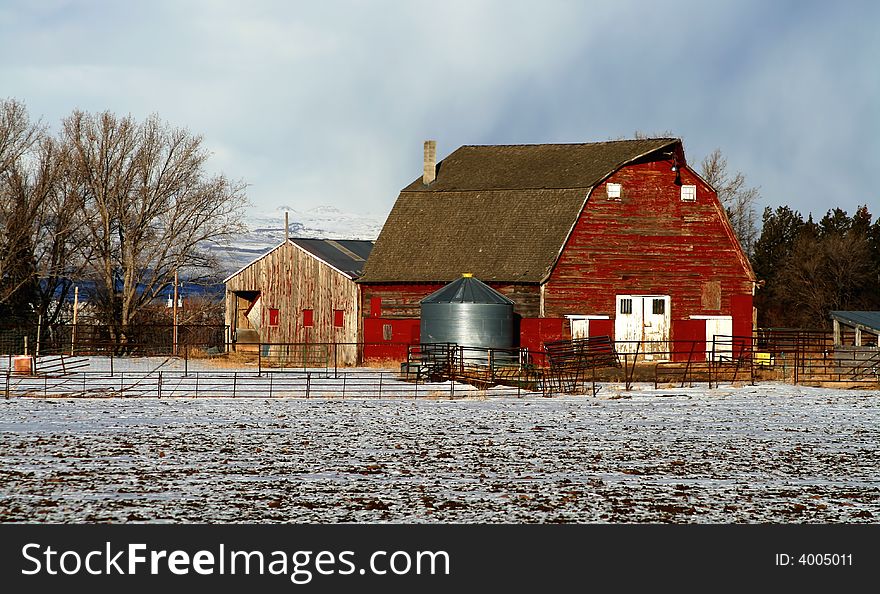 Red barn in early winter in south central Idaho. Red barn in early winter in south central Idaho