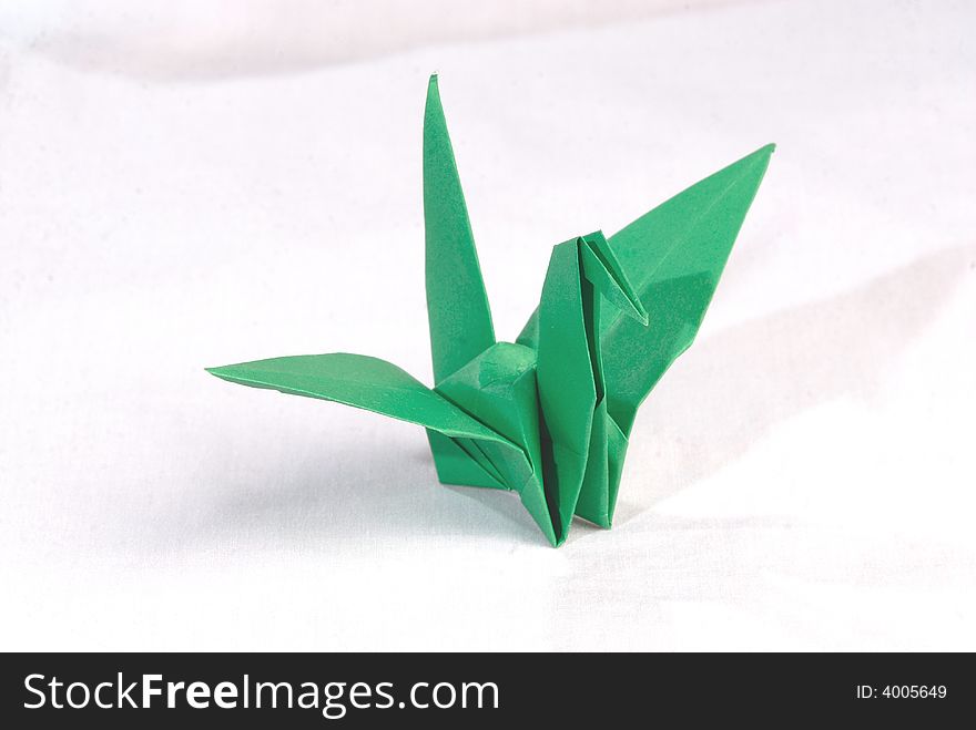Green bird made of paper. Green bird made of paper