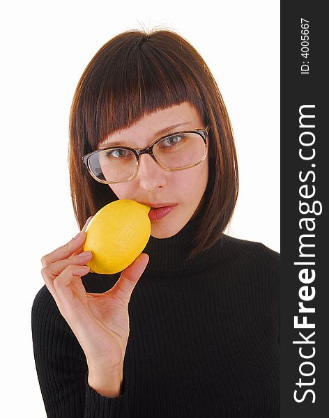 Young ang pretty woman with yellow lemon and glasses. Young ang pretty woman with yellow lemon and glasses