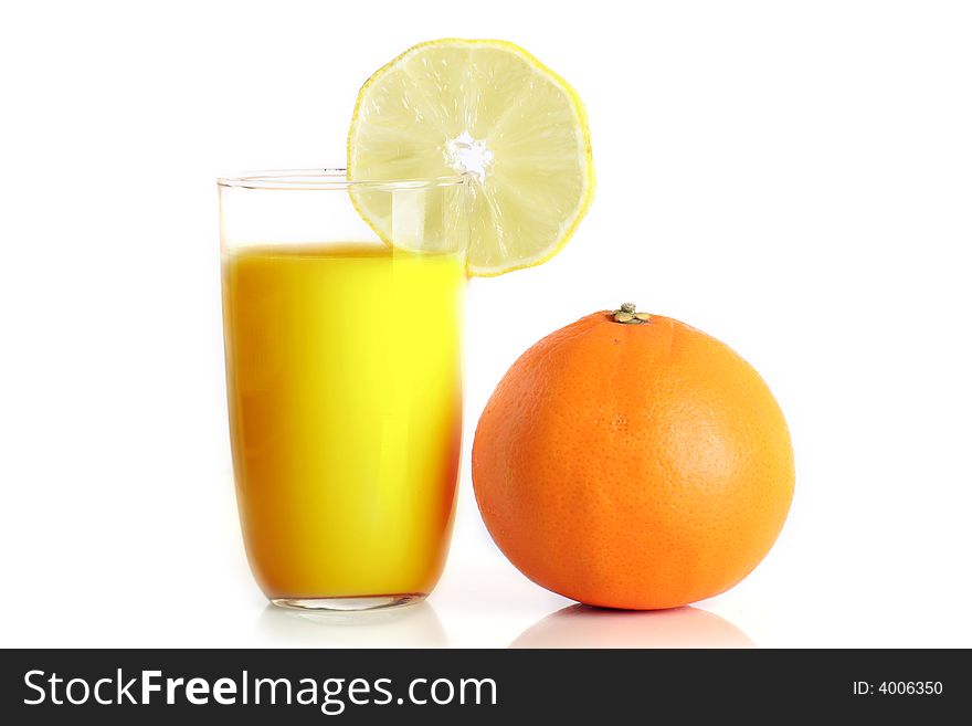 Orange Juice and an orange isolated on white background