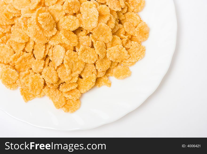 Cornflakes on white background. Healthy food image series