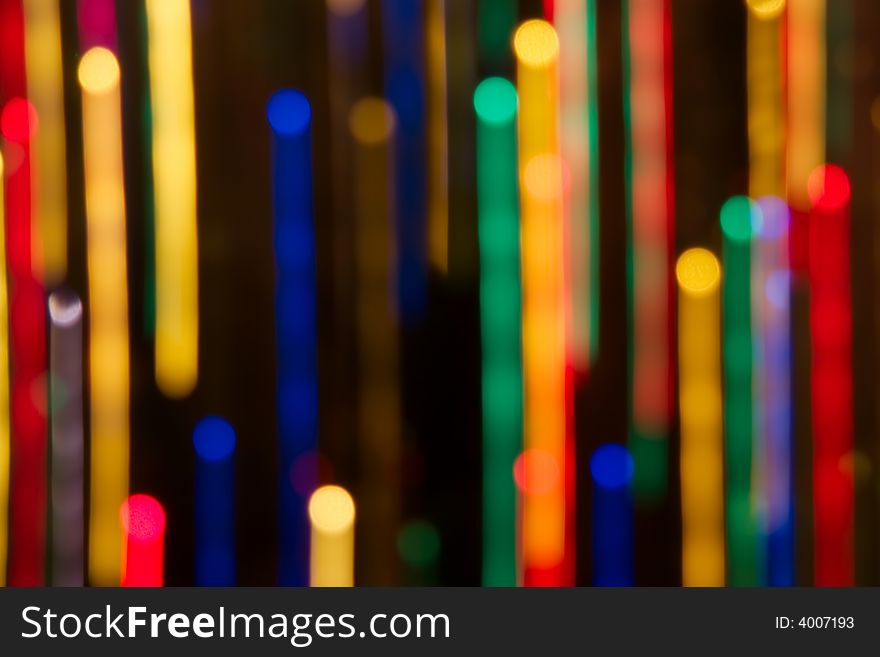 Abstract unfocused stripes of colored lights