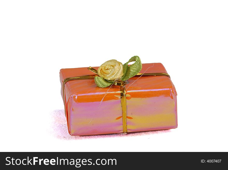 Pink orange color gift present box with ribbon