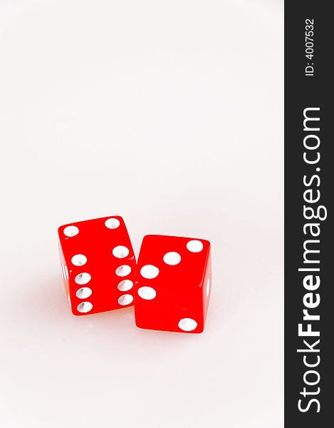 Isolated lucky red dice showing seven combined