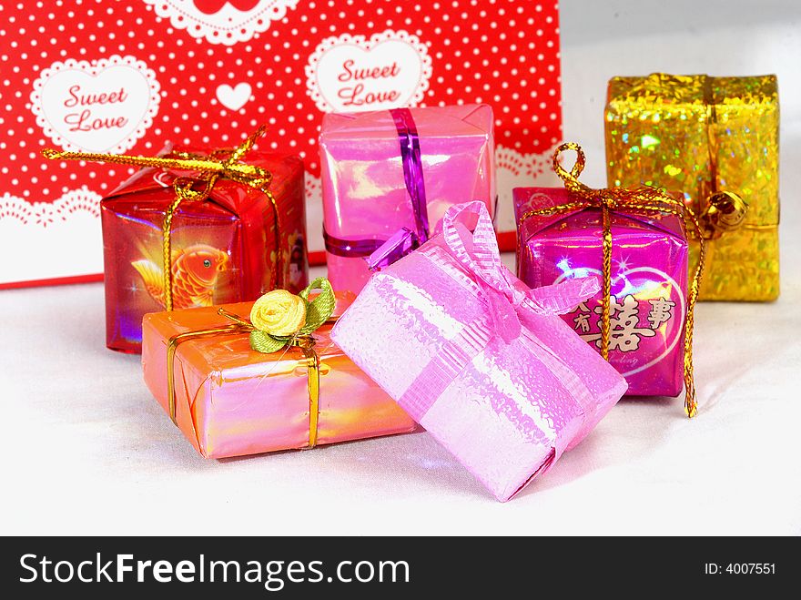 Pink color gift present box with ribbon