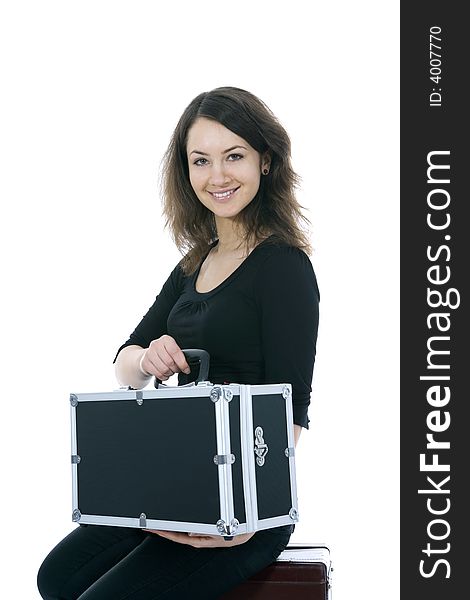 Young woman with  suitcase on  isolated background