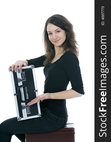 Young woman with  suitcase on  isolated background