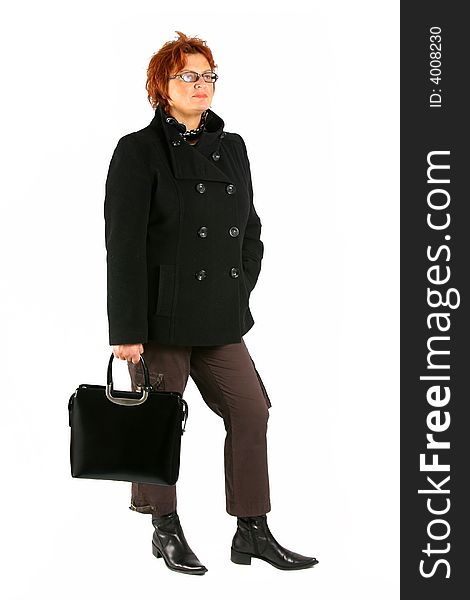 Over white mature businesswoman with briefcase is standing. Over white mature businesswoman with briefcase is standing