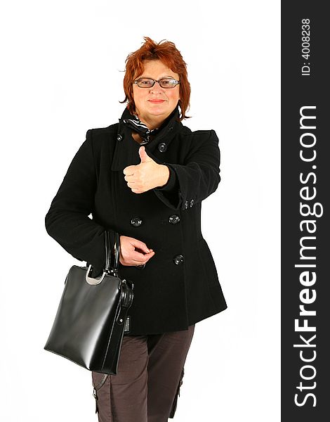 Mature businesswoman is showing that all is ok. Mature businesswoman is showing that all is ok