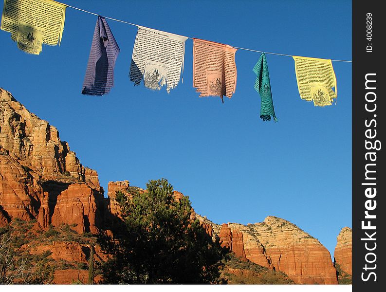 Colorful prayer flags over spiritual sedona. Colorful prayer flags over spiritual sedona