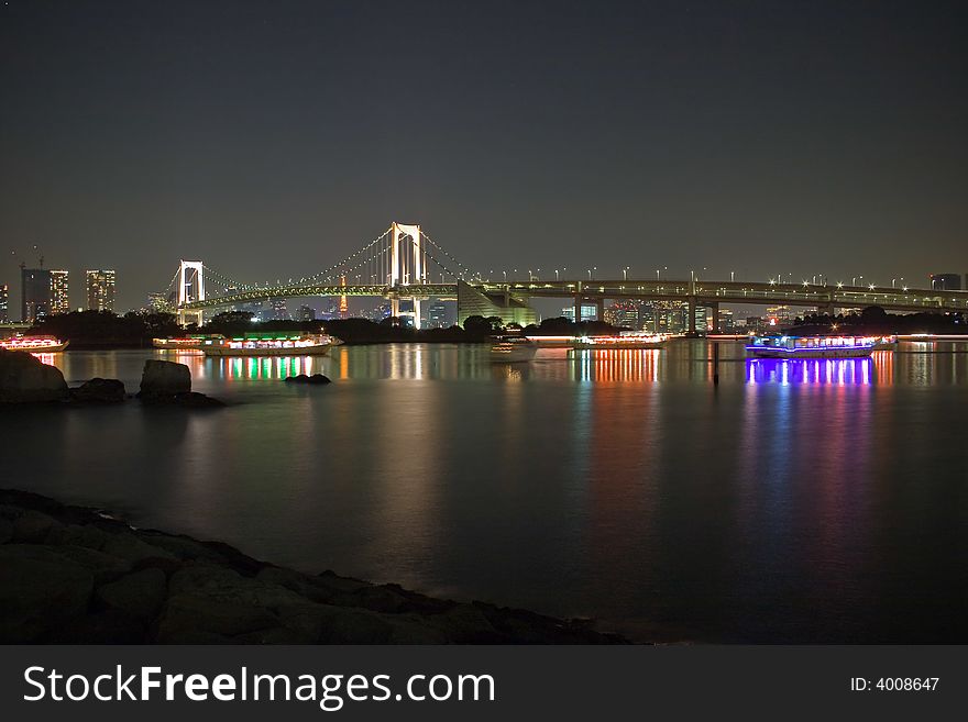 A night shot of the Rainbow Bridge in Tokyo, Japan. A night shot of the Rainbow Bridge in Tokyo, Japan