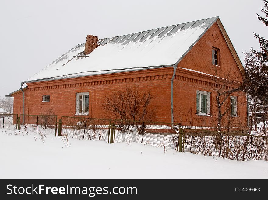 The rural brick house.