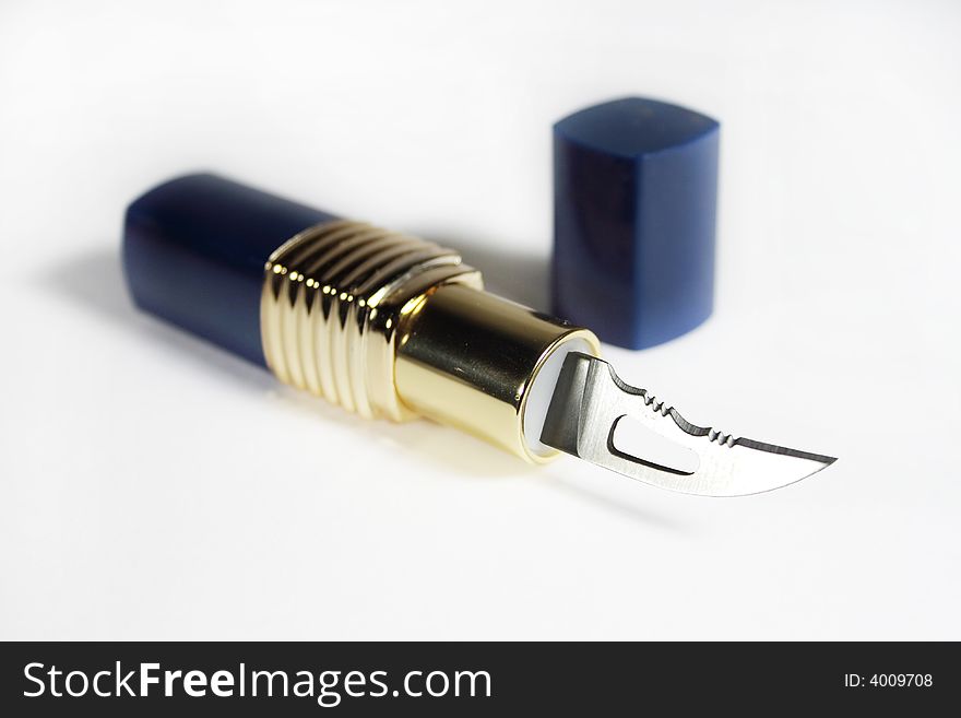 Tube of Lipstick with knife, close up