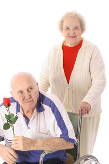 Wife Pushing Elderly Husband Stock Image Wife Pushing Elderly Husband Stock Image