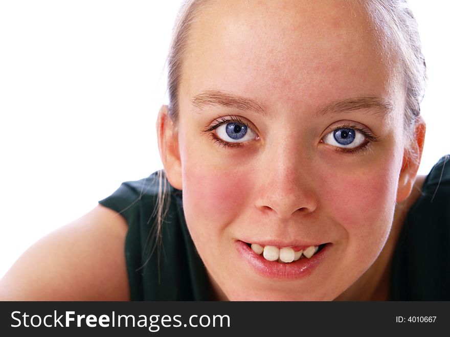 Beautiful blue eyes. Close up of teenage girl's face and eyes.