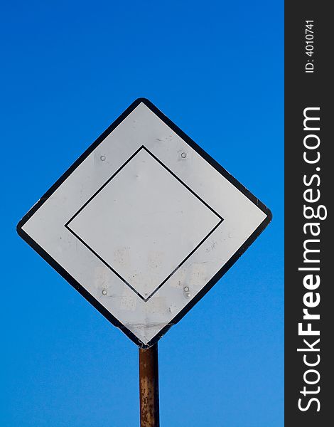 Traffic sign isolated on clear blue sky
