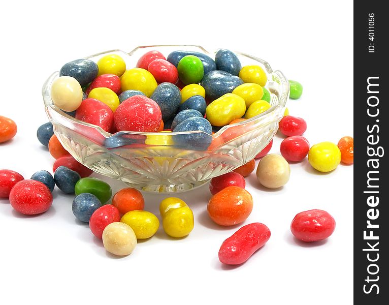 Group of coloured sweet candies isolated over white background