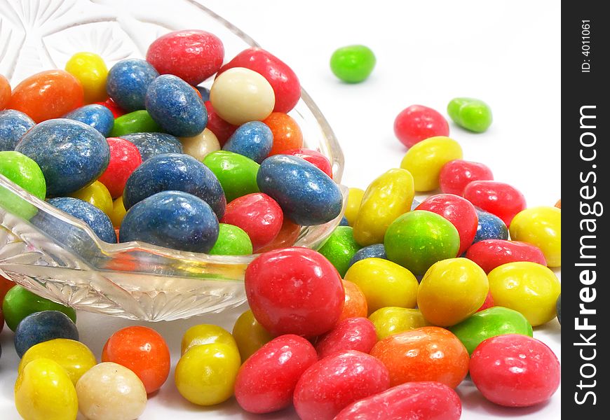 Group of coloured sweet candies isolated over white background