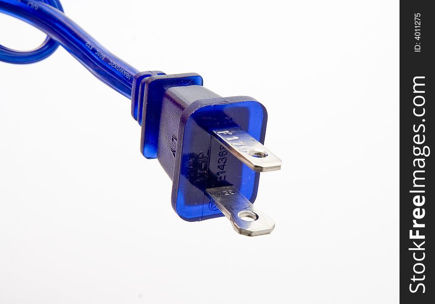 A blue power cord with a cut and frayed end. A blue power cord with a cut and frayed end.