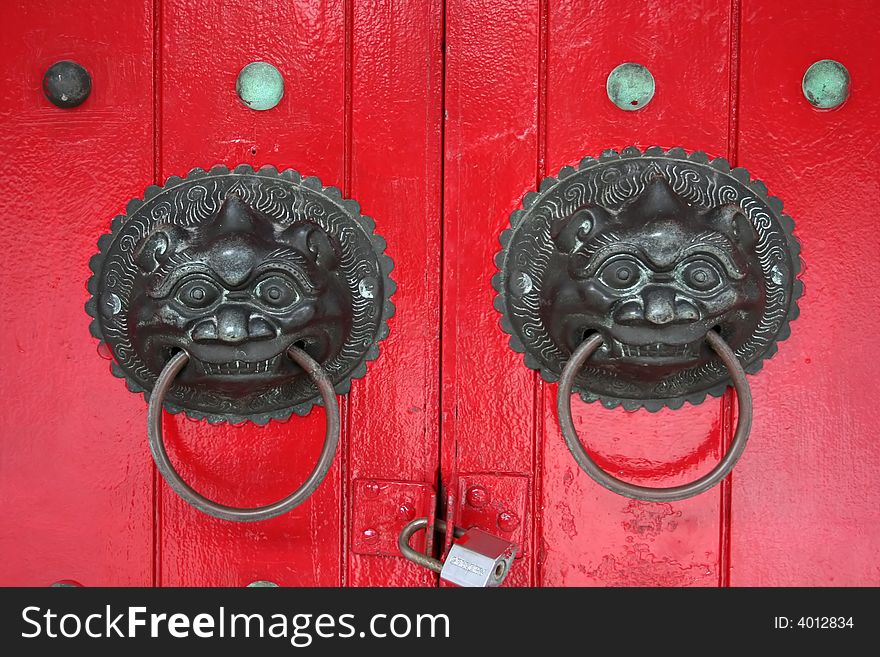 Strange lion head door knockers. Strange lion head door knockers