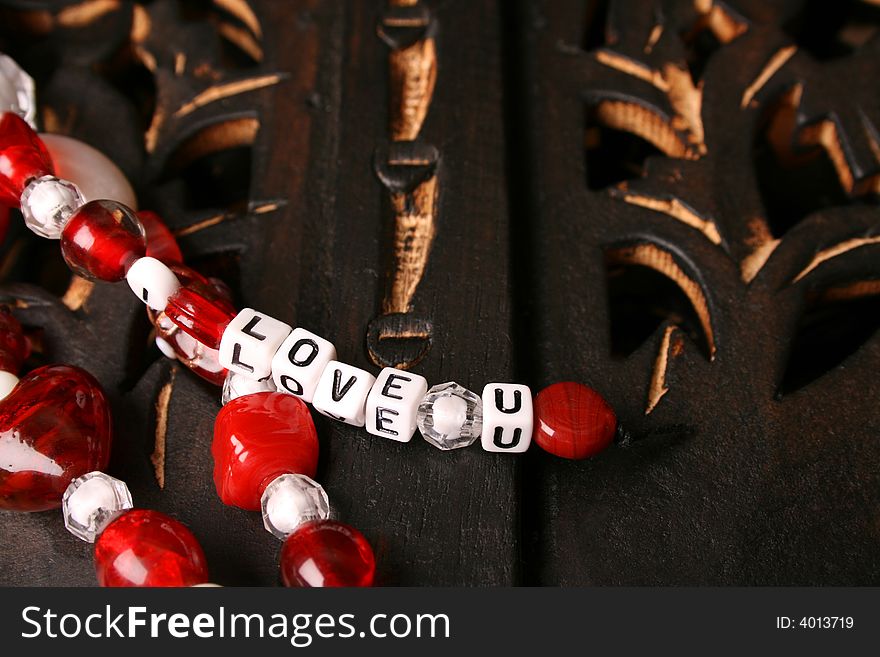 Red and white valentines beads with letters. Red and white valentines beads with letters