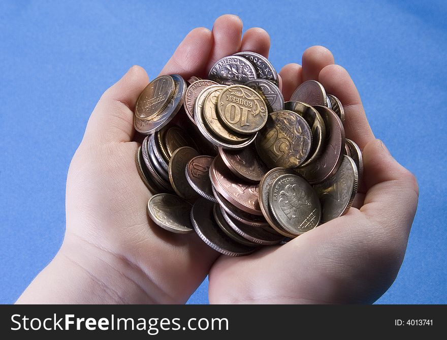 metal coins in the hands of. metal coins in the hands of