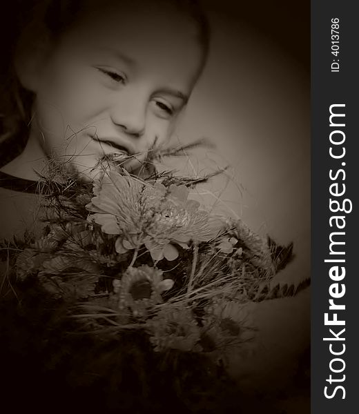Boy with flower in sepia tone