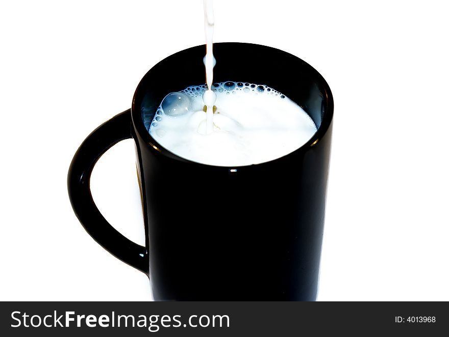 Black mug of freshness motion milk. Black mug of freshness motion milk