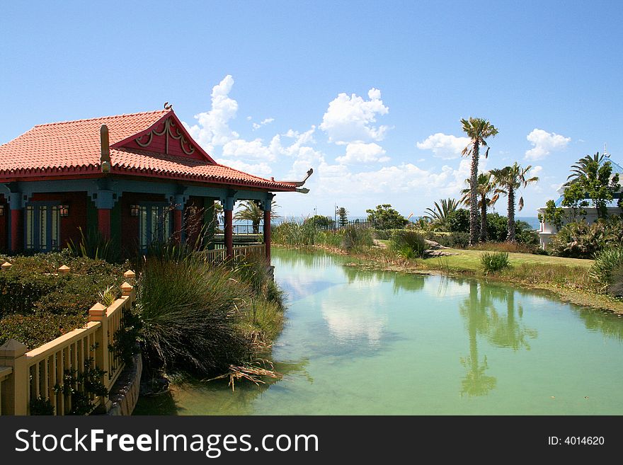 Oriental building at a water front showing off typical style of building and architecture