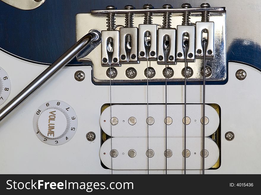 Macro shot of an electric guitar with breaked off string