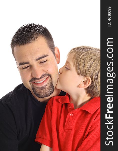 Shot of a child kissing father isolated on white