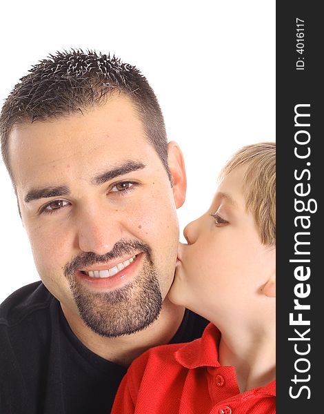 Little boy kissing father