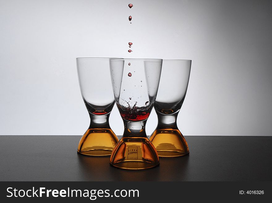 Beautifuly designed drinking cups with drops faling. Beautifuly designed drinking cups with drops faling