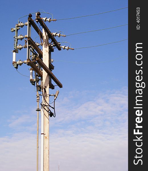 An electrical power pole with capacitors.