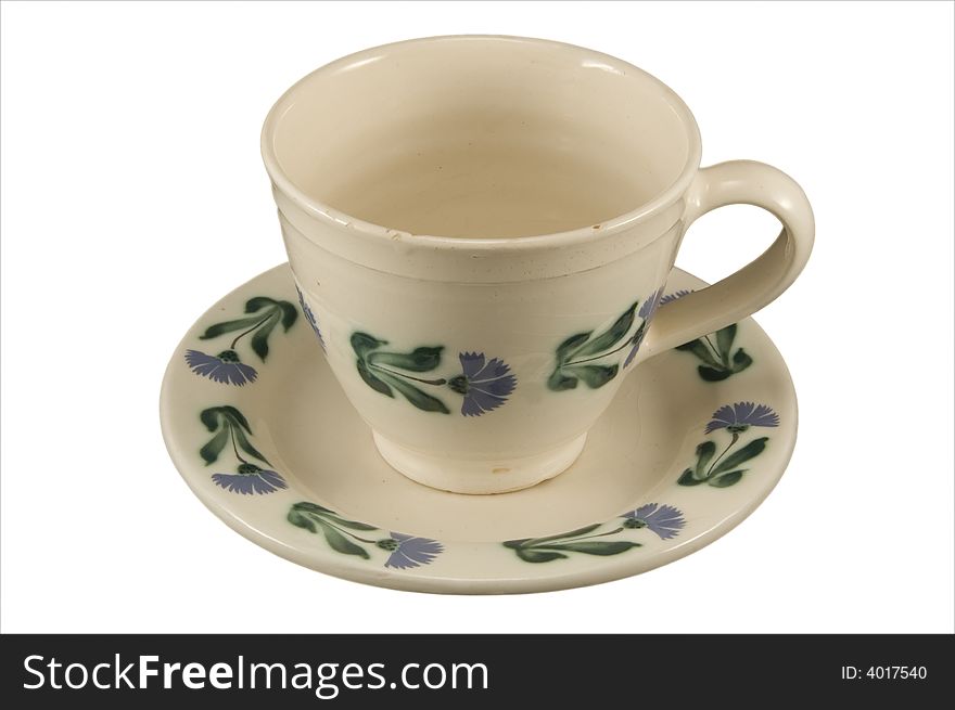 Empty tea cup with saucer isolated on white.