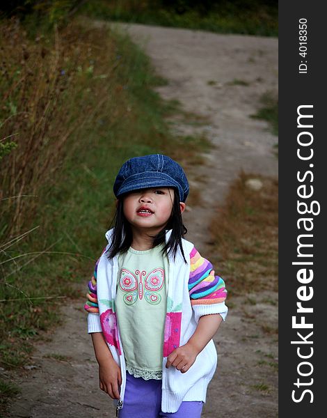 Toddler taking a break after a long hike. Toddler taking a break after a long hike