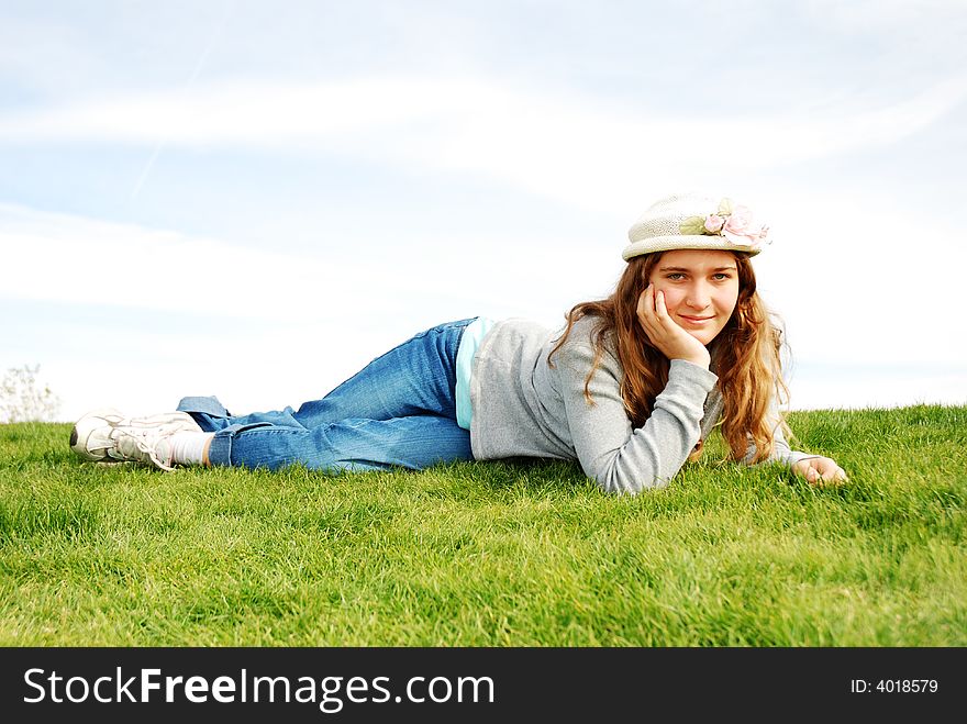 Young girl is enjoying herself at outdoor location