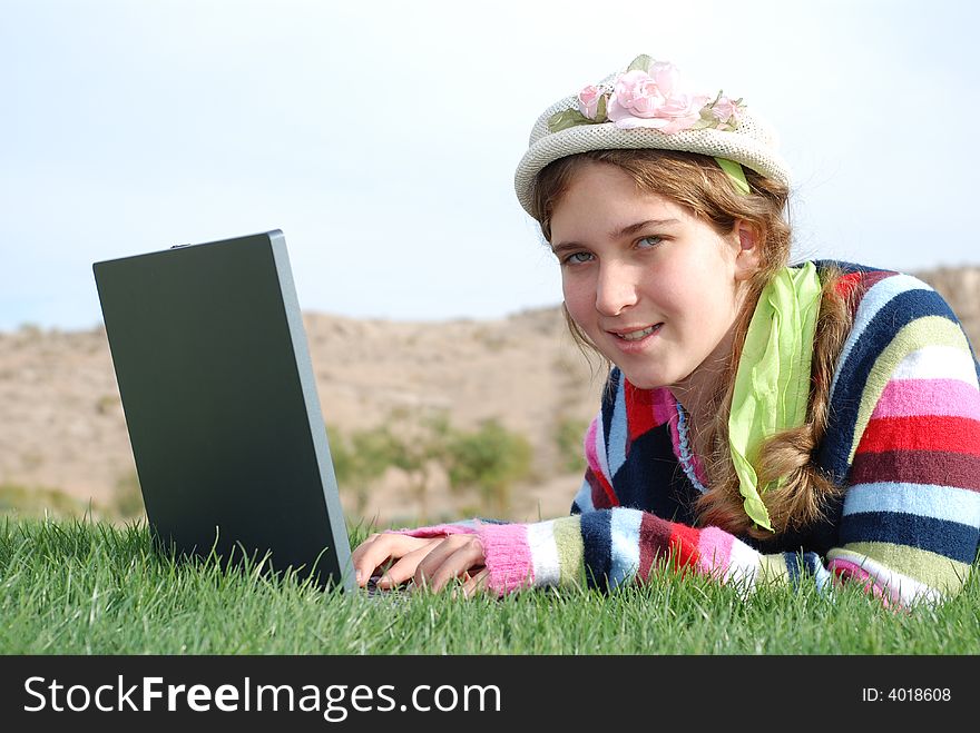 Young girl and laptop