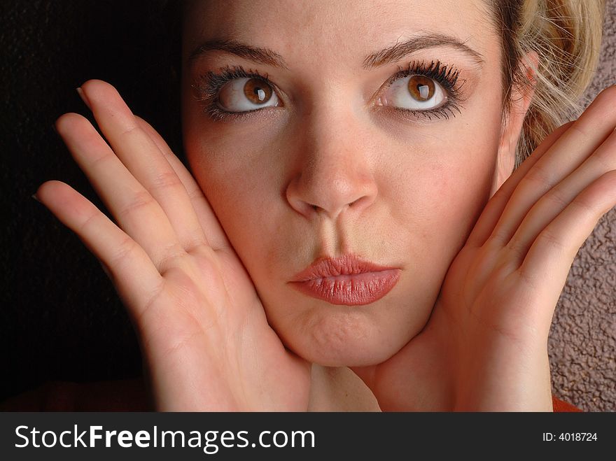 Sexy woman has a reckless expression on her face