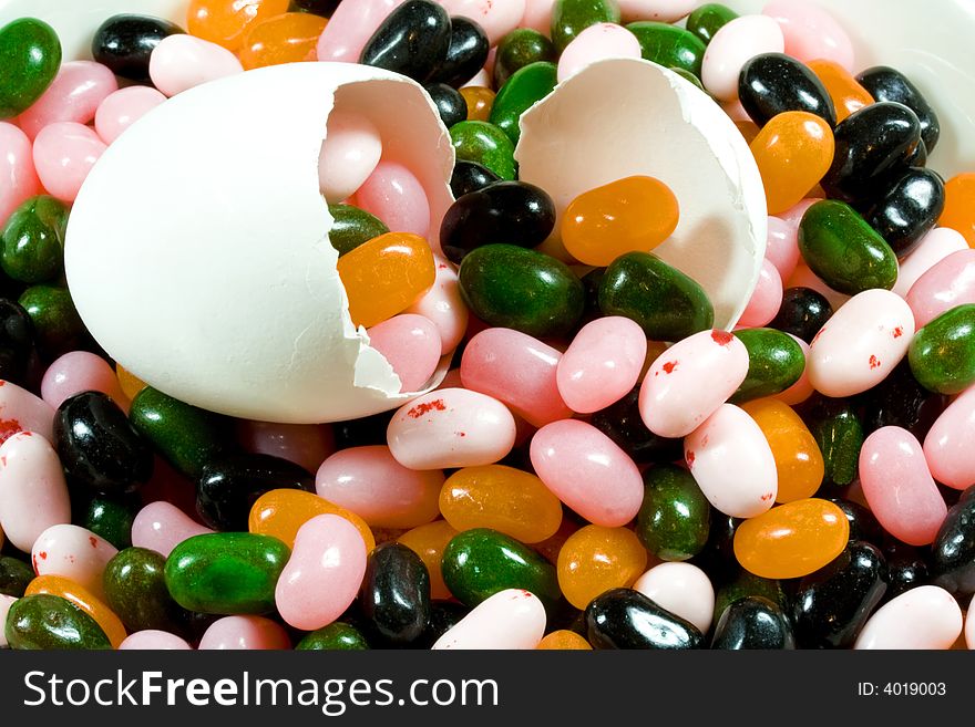 Easter style jelly beans hatching out of an egg
