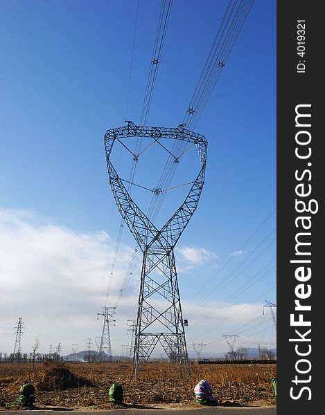 Electric power lines on farm field