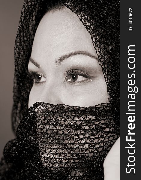 Women in cover showing only her eyes