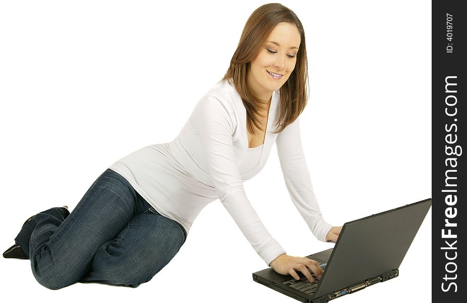 Caucasian girl using laptop with happy expression. Caucasian girl using laptop with happy expression