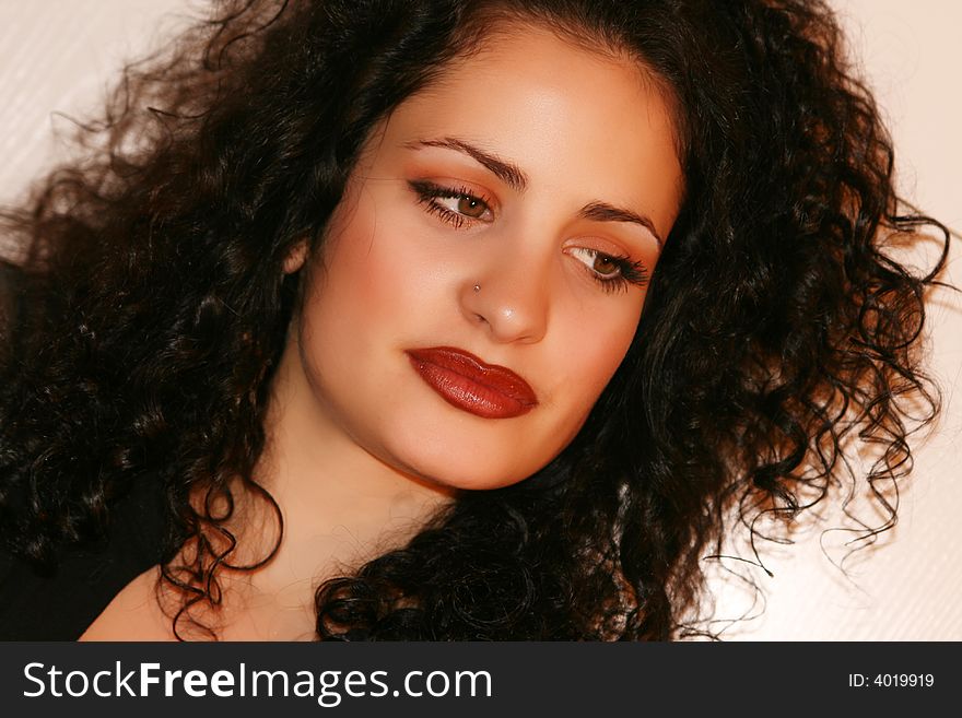 Beautiful young woman with warm red lips. Beautiful young woman with warm red lips